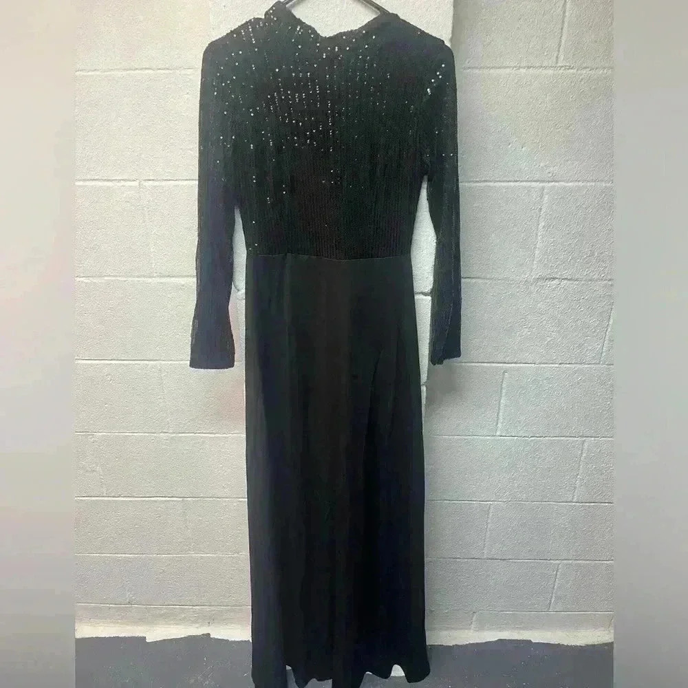 Miss Ord black dress